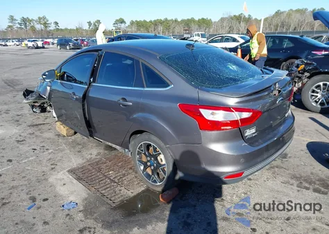 2012 Ford Focus Titanium z USA, uszkodzony, nr VIN 1FAHP3J20CL369708